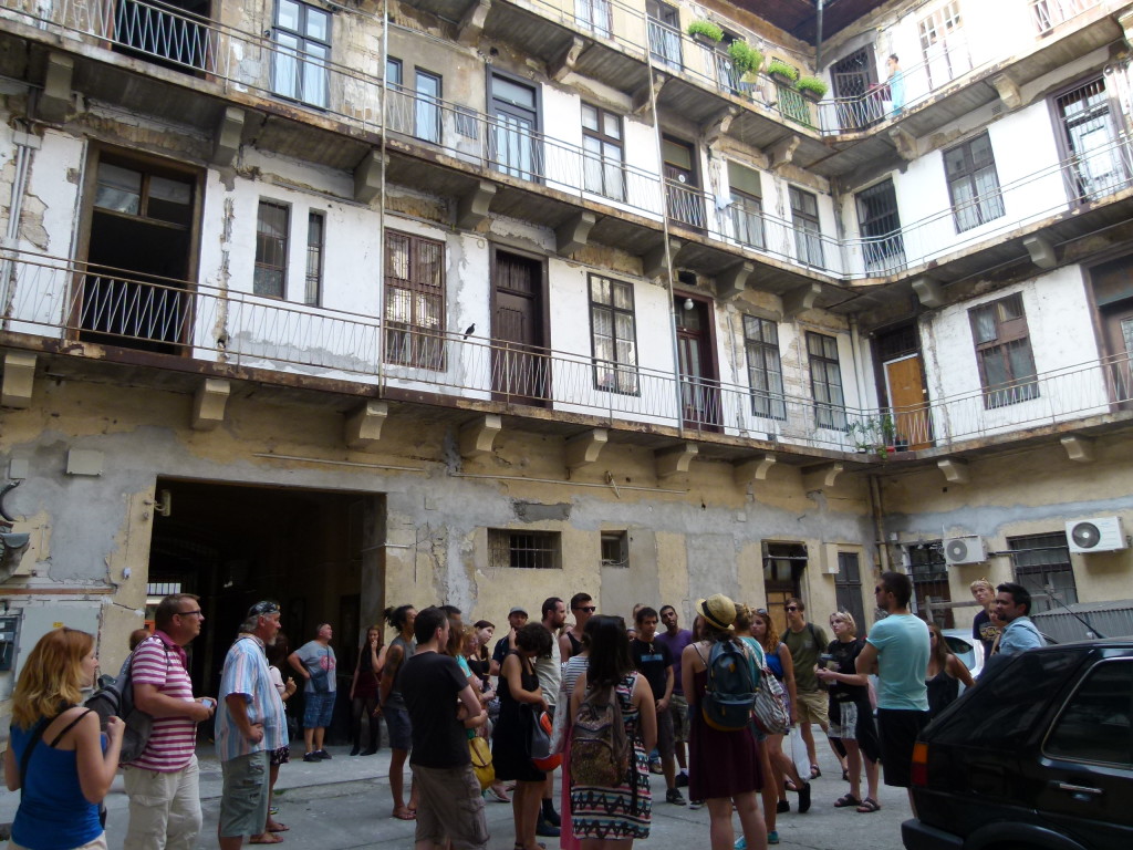 Old Jewish tenement building, now run down and used by less fortunate.