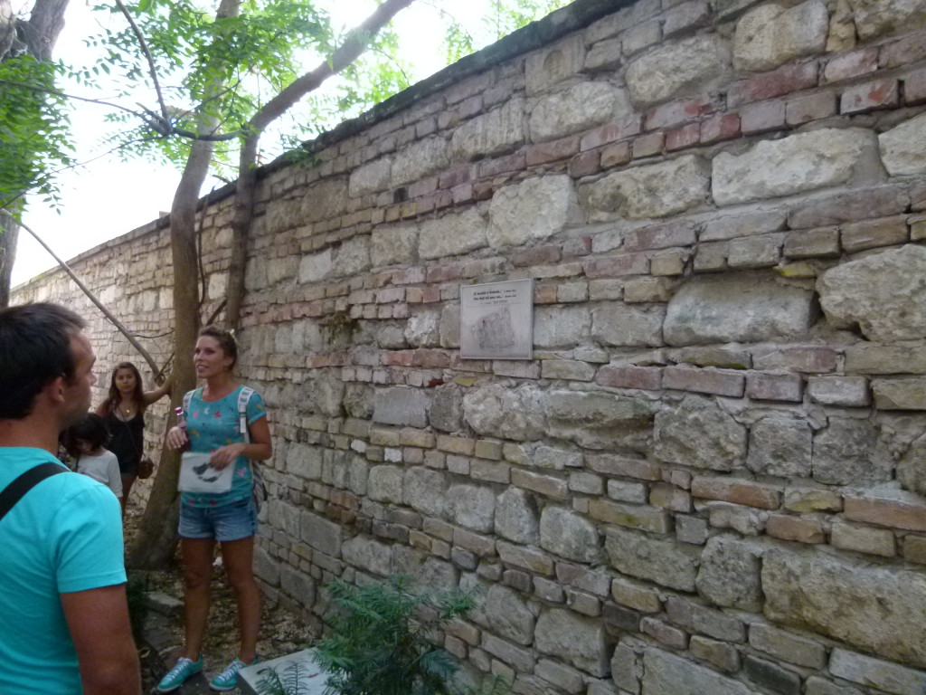 Old ghetto wall, rebuilt because of illegal demolition while building behind.