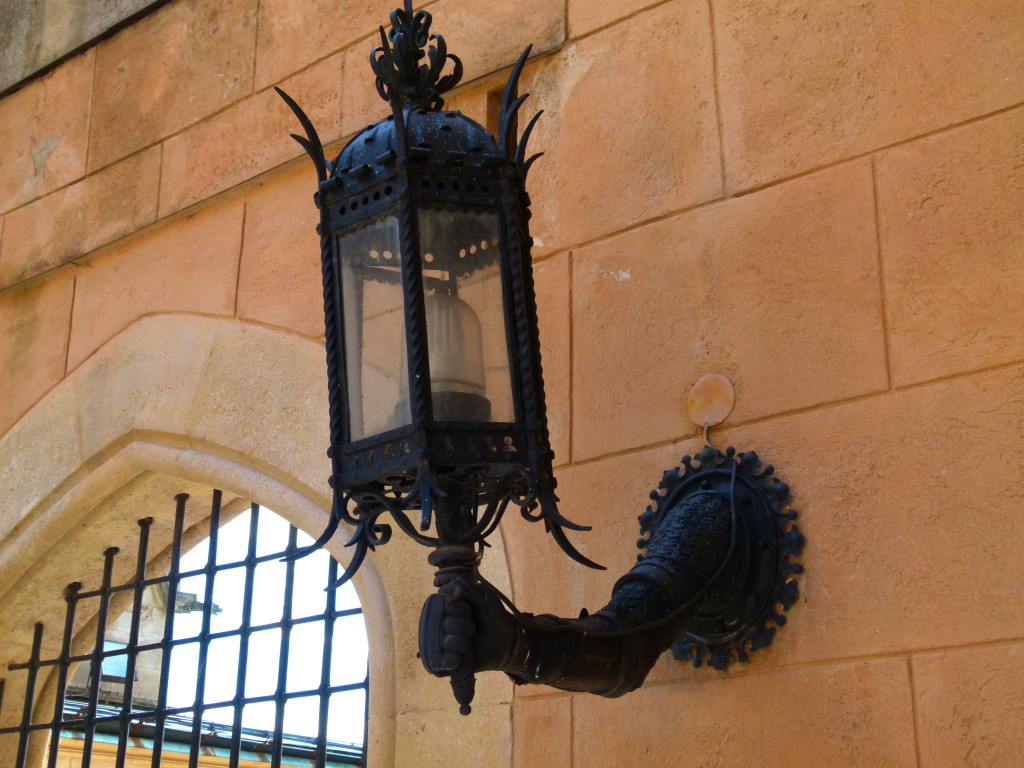In the courtyard we saw this lamp which looks like an arm coming out of the wall holding it up.