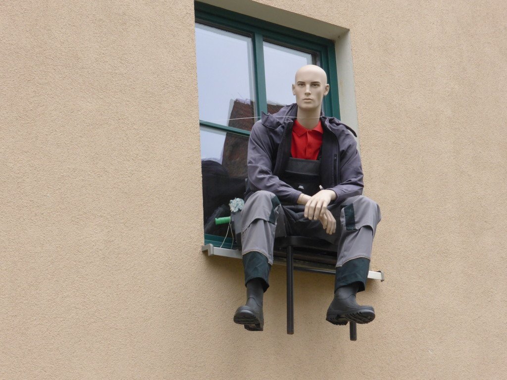 A we were walking back we saw a man sitting on the window ledge, on closer inspection he was a dummy.