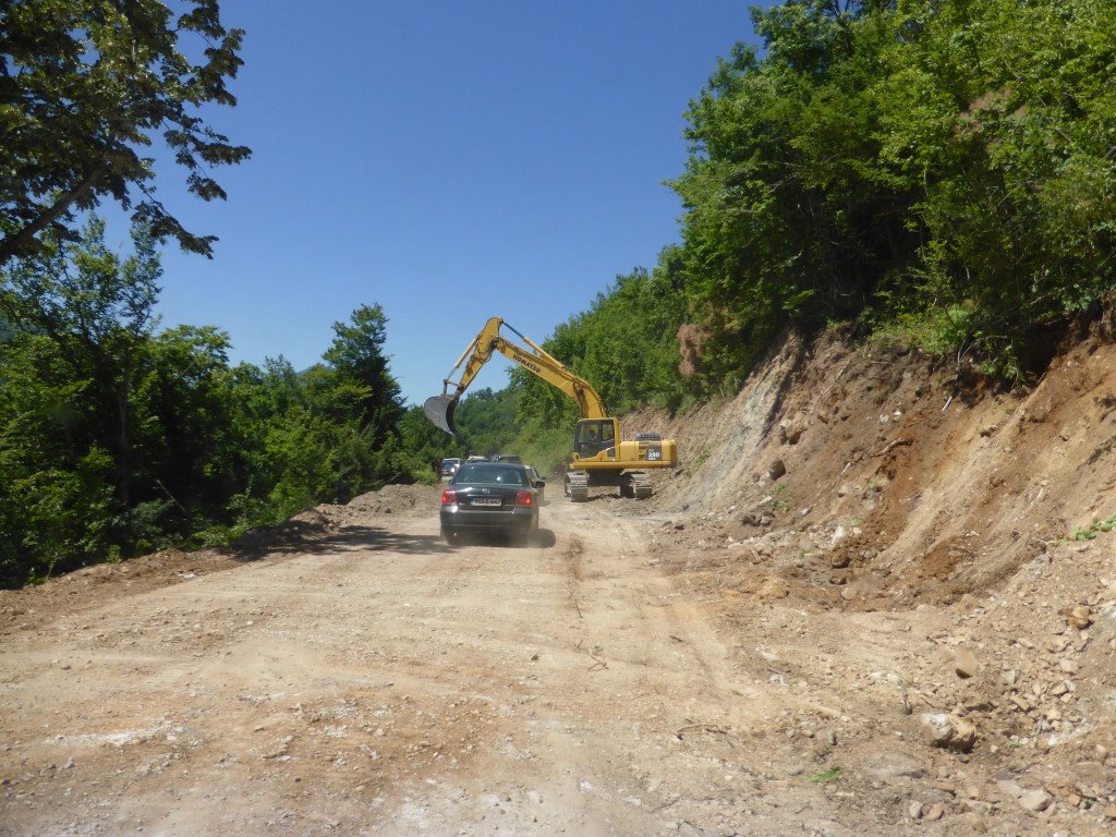 Roadworks after the border crossing. It was slow going and very dusty. We had to drive under the the arch of the machine ahead.