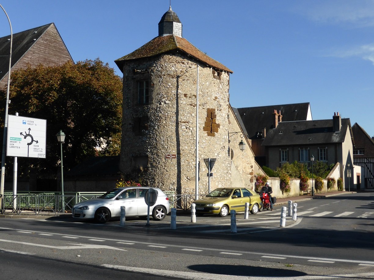 Part of the old walls. I waited forever to try and get a photo without a car in it, but they just kept coming.