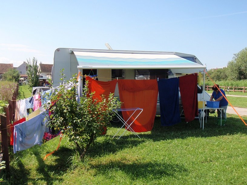 A busy day washing all our clothes and bedding in a Romanian campsite.