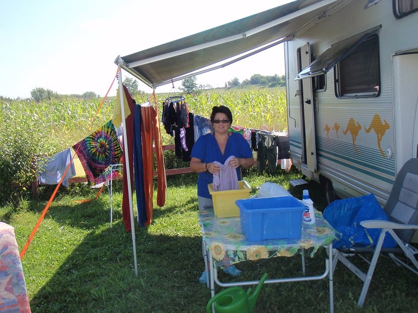 Giving the clothes the final rinse. We did have a glass of wine and a relaxing afternoon when we finished. You cant work all the time!!!